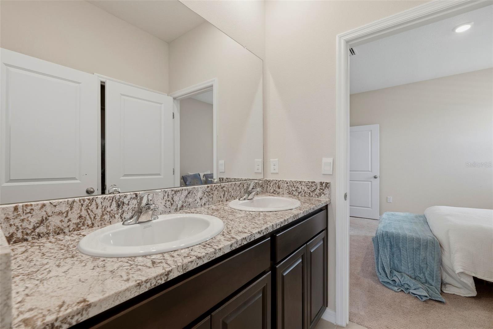 Double vanities and bathtub in Jack and Jill Bathroom