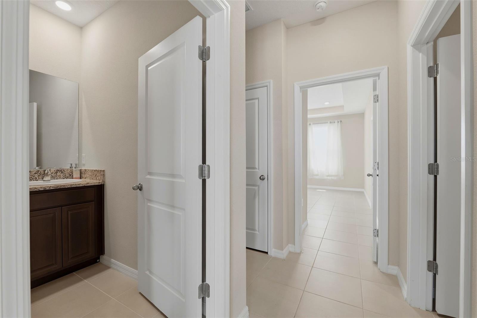 Mudroom entrance from the garage, leading to the guest suite entrance.