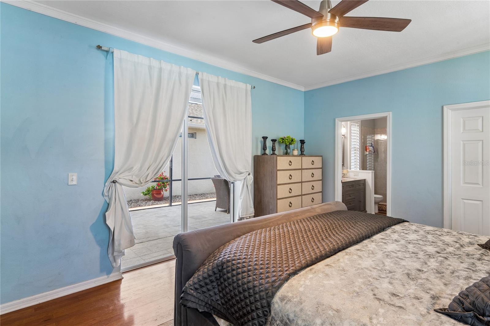 Primary bedroom with sliders to lanai