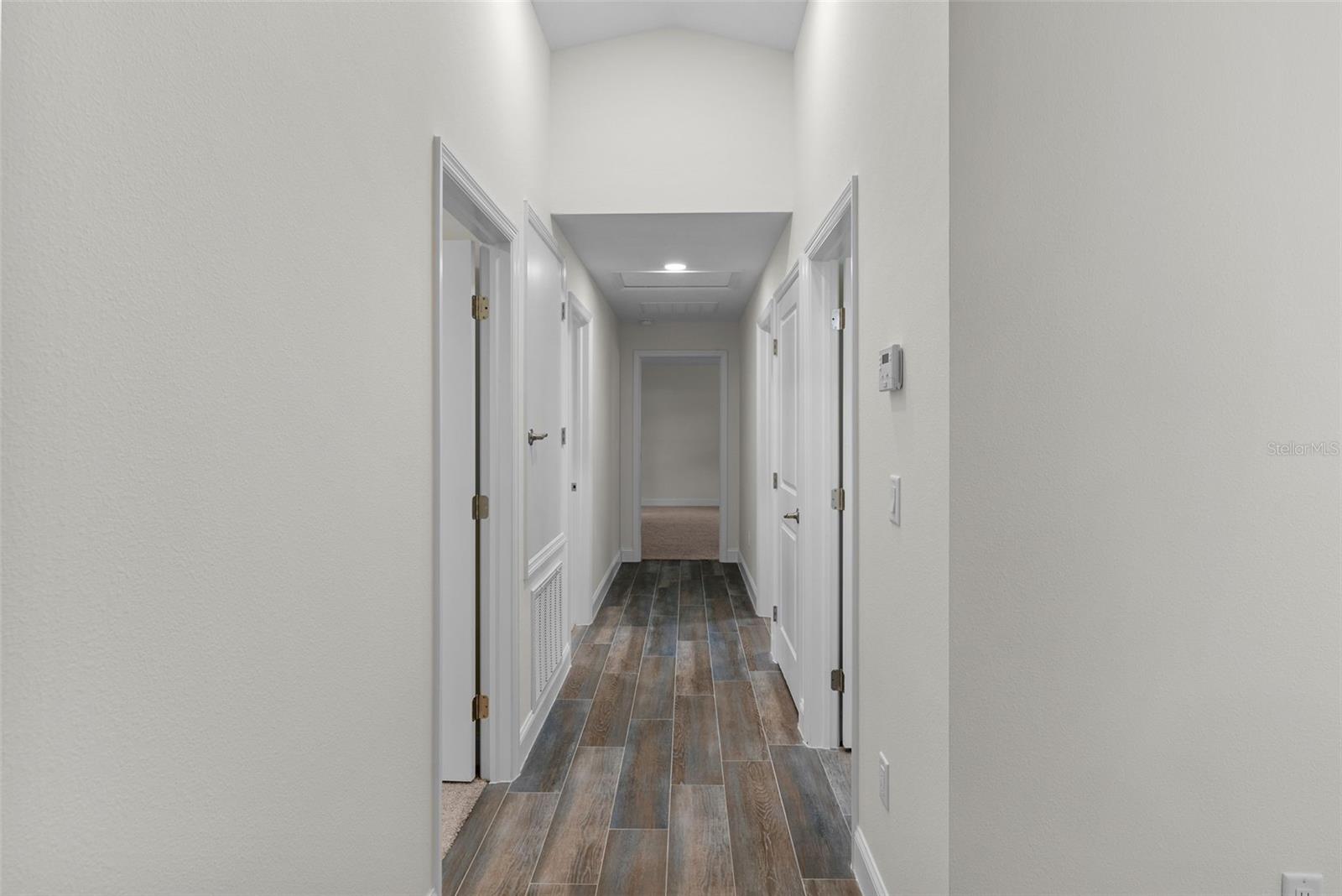 Hallway to Bedrooms & Laundry Closet