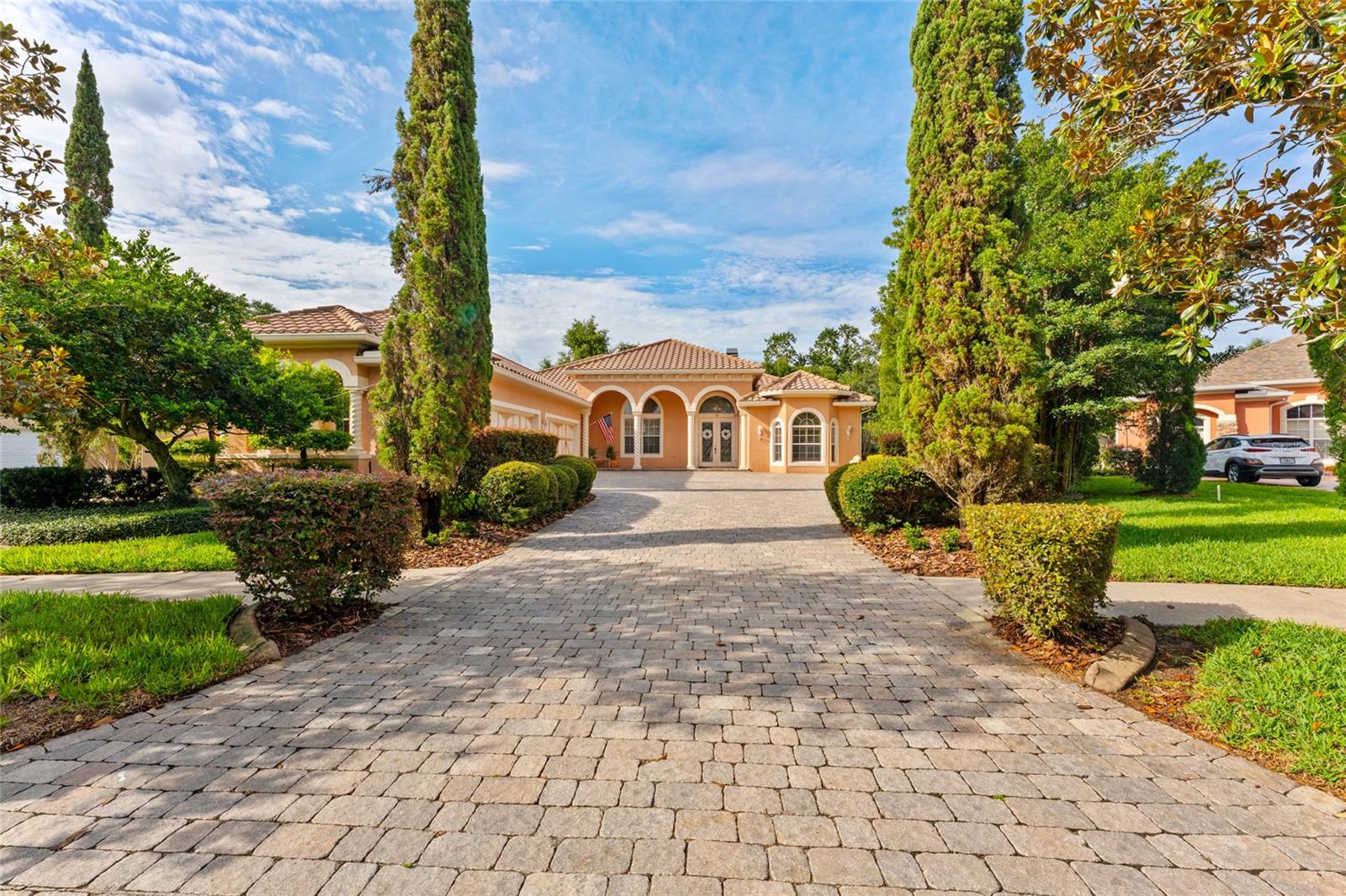 Mature landscaping accents this large lot