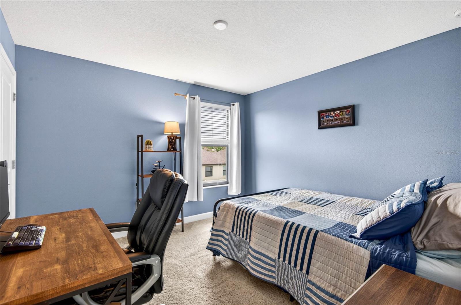 Upstairs bedroom with blinds
