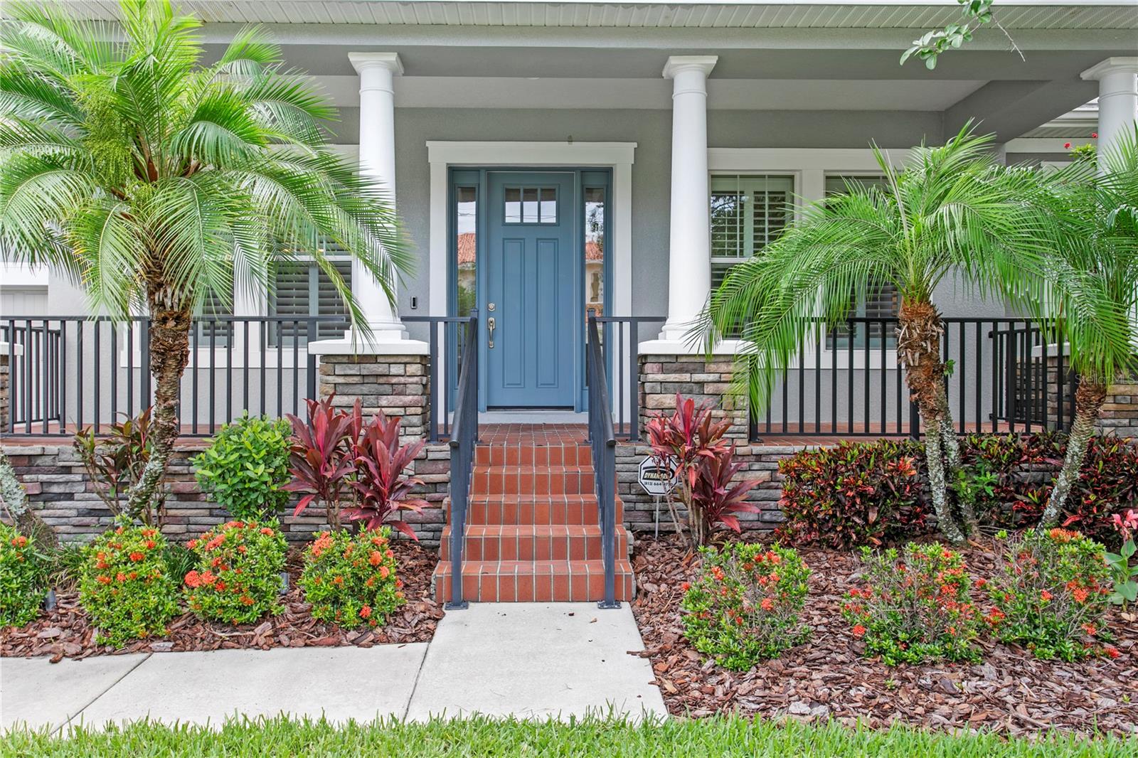 To this beautifully elevated residence situated on a generous 75' x 120' lot in the heart of South Tampa