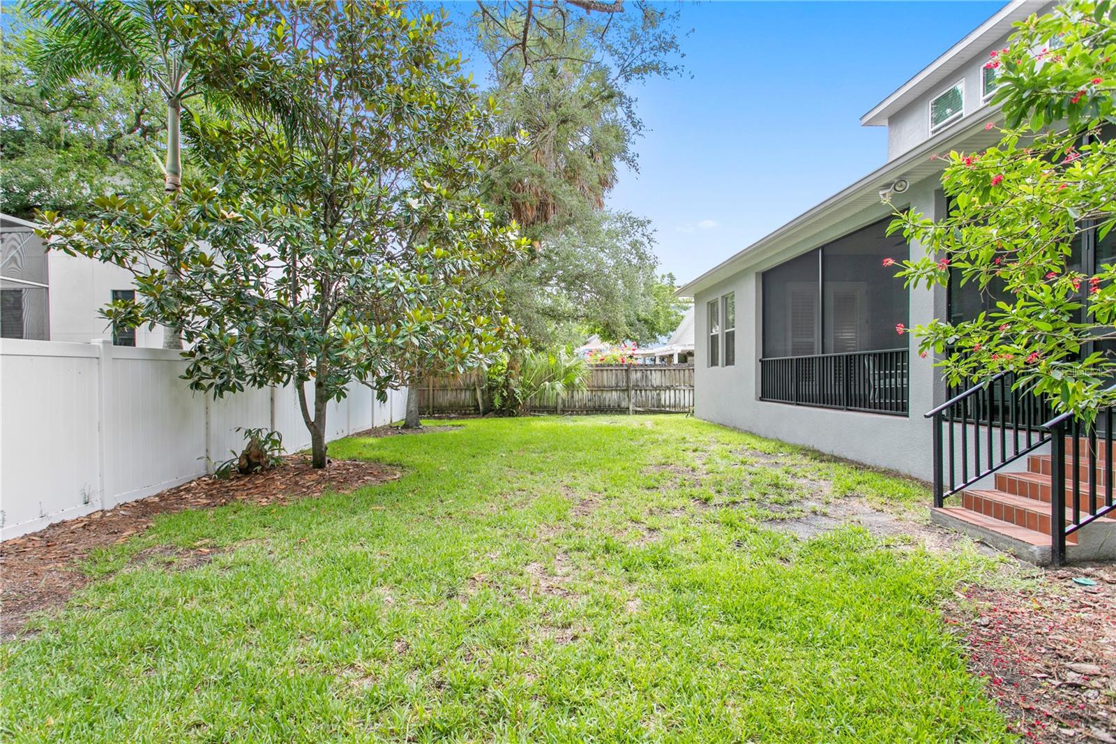 The sizable yard offers room to design a pool.