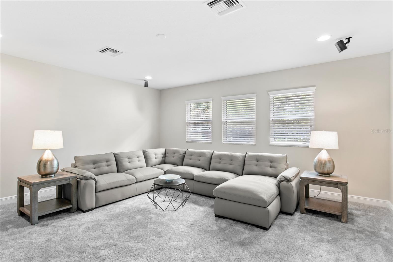 Oversized bonus room that can easily adapt to your lifestyle as a media room, playroom, fitness studio, home office, or game room.
