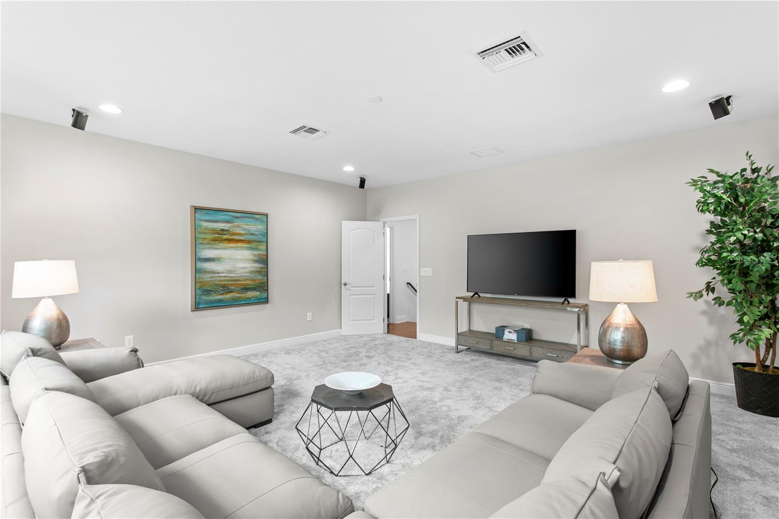 oversized bonus room that can easily adapt to your lifestyle as a media room, playroom, fitness studio, home office, or game room.