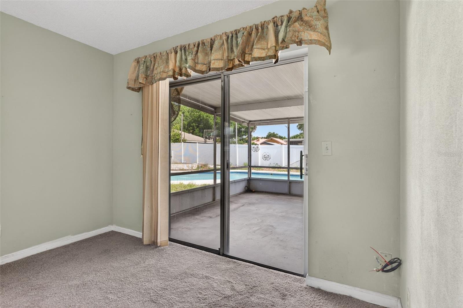 Primary Bedroom Leads to Screened Patio