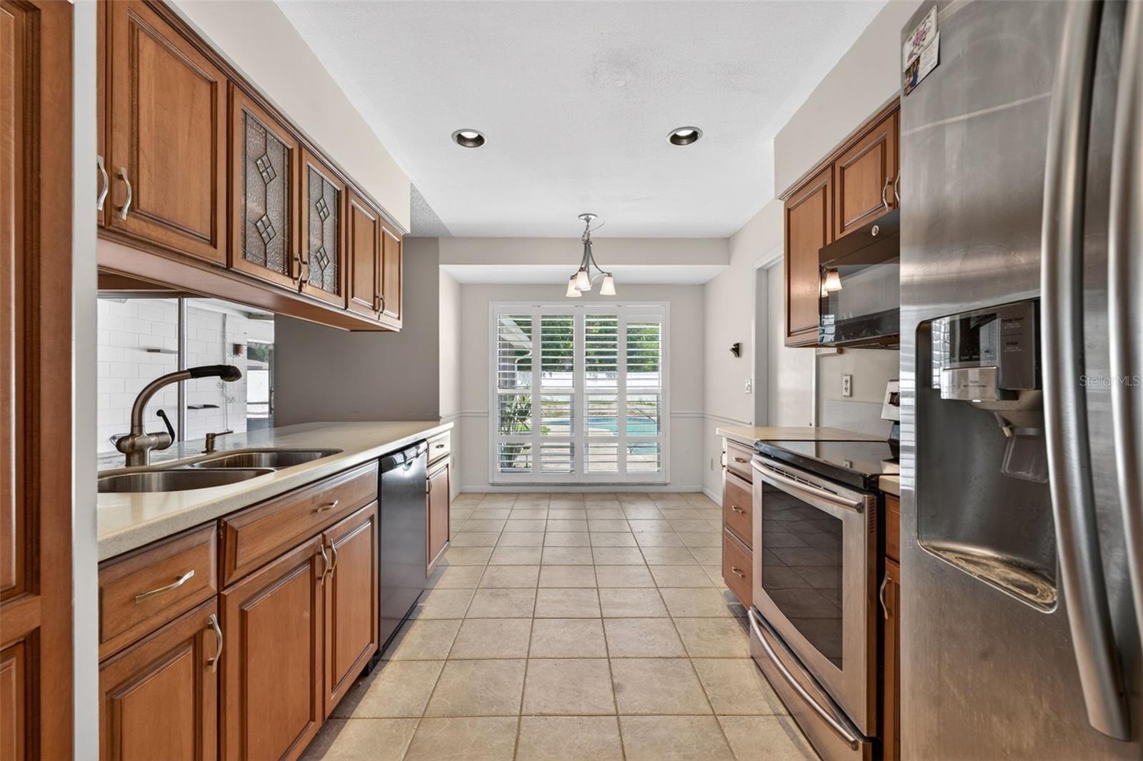 Kitchen with Table Nook Overlooking the Pool