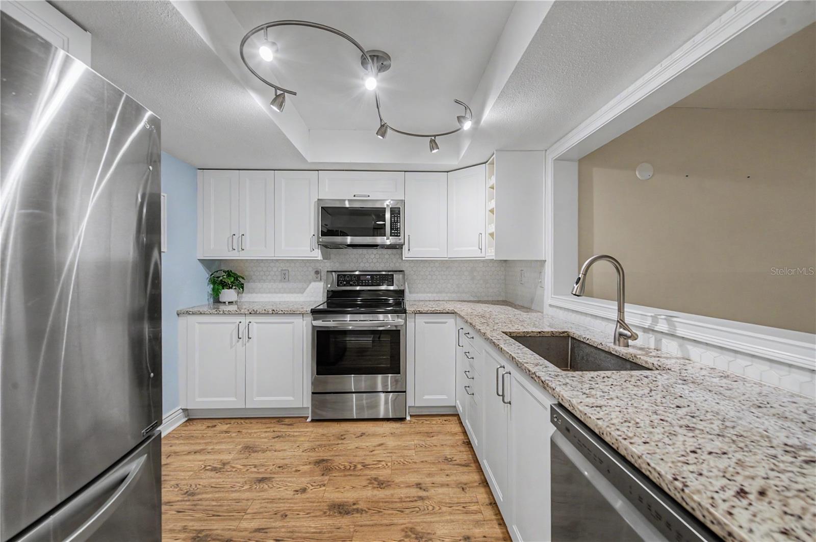 OPEN, ROOMY, & BRIGHT KITCHEN!