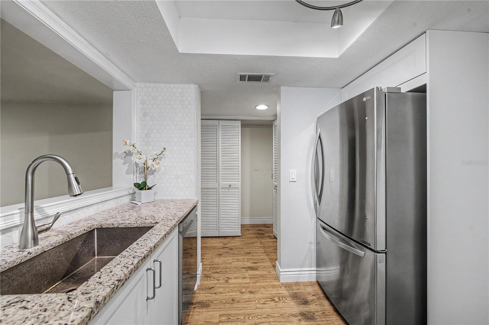Dishwasher, refrigerator, range, microwave - all newer, all stainless steel, and ALL INCLUDED!