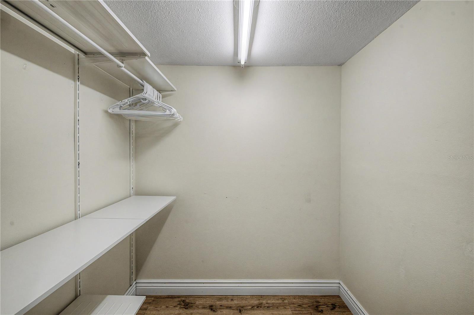 Huge primary bedroom walk-in closet.