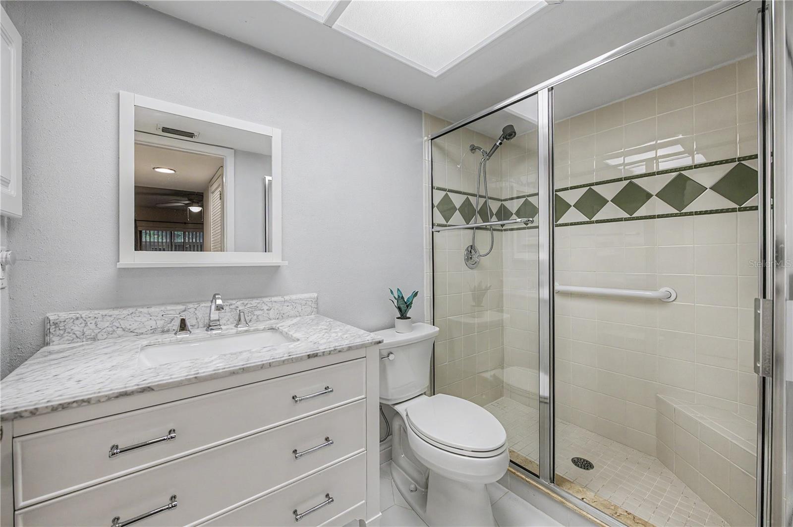 PRIMARY BATHROOM (ensuite) - WALK-IN SHOWER with BENCH!