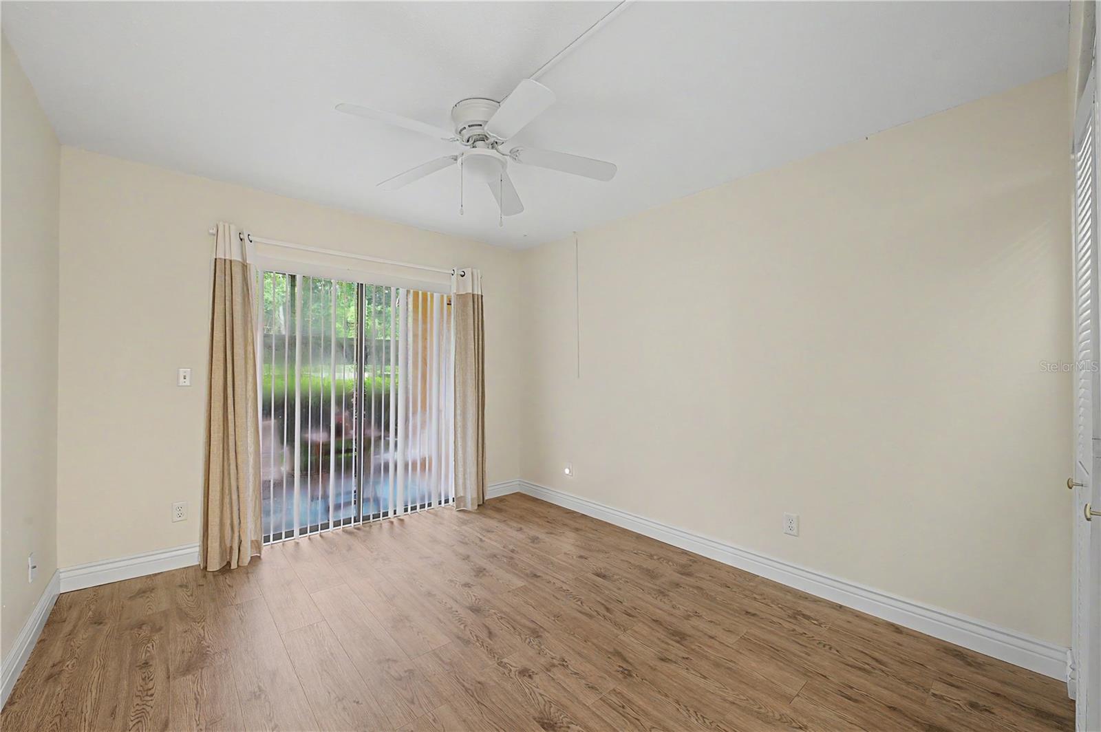 Second bedroom with big walk-in closet opens to one of the two private patios!