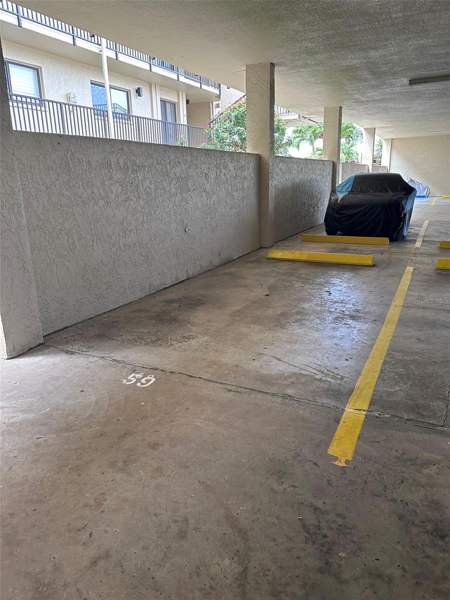 Covered assigned parking garage space