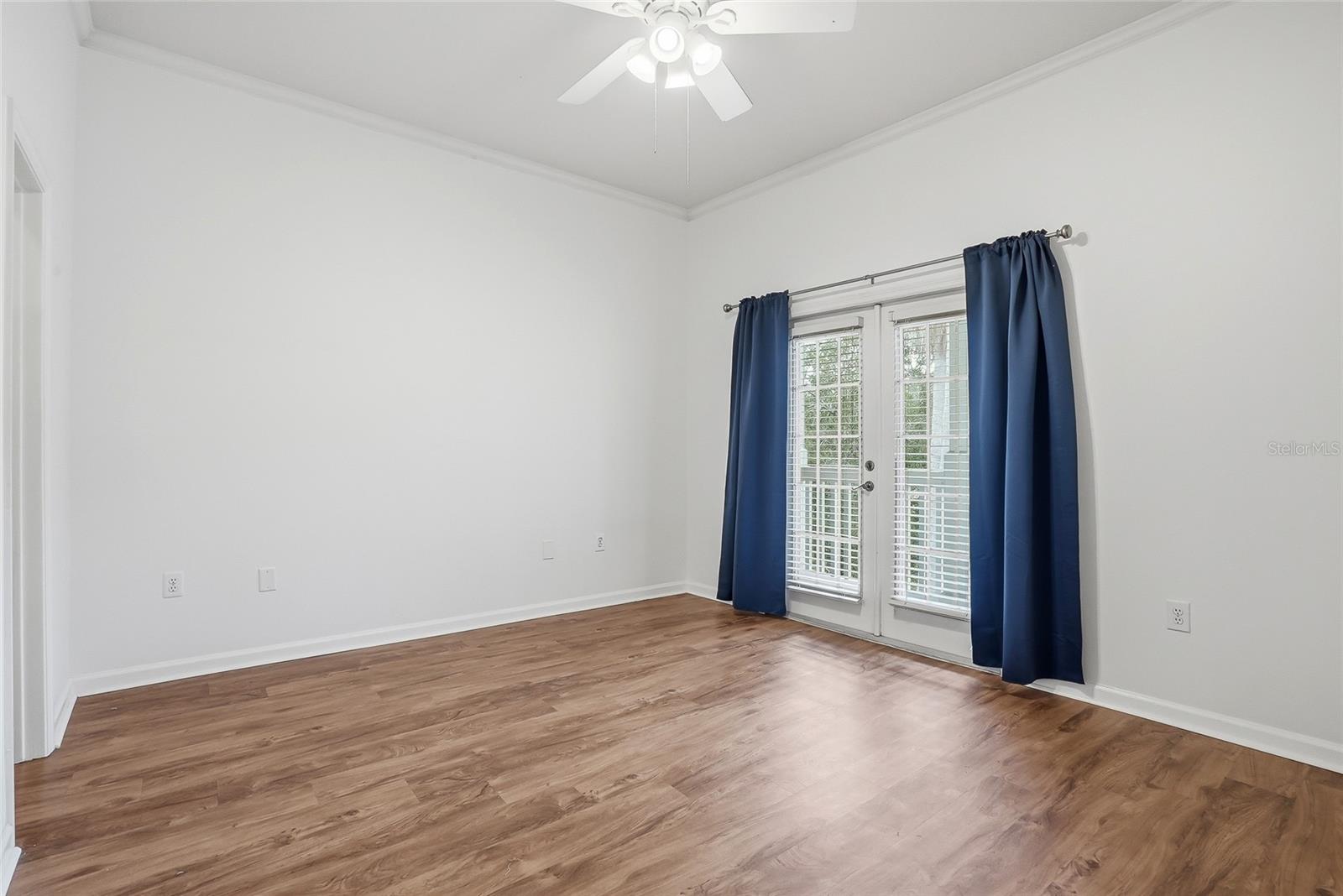 Primary Bedroom with a Balcony