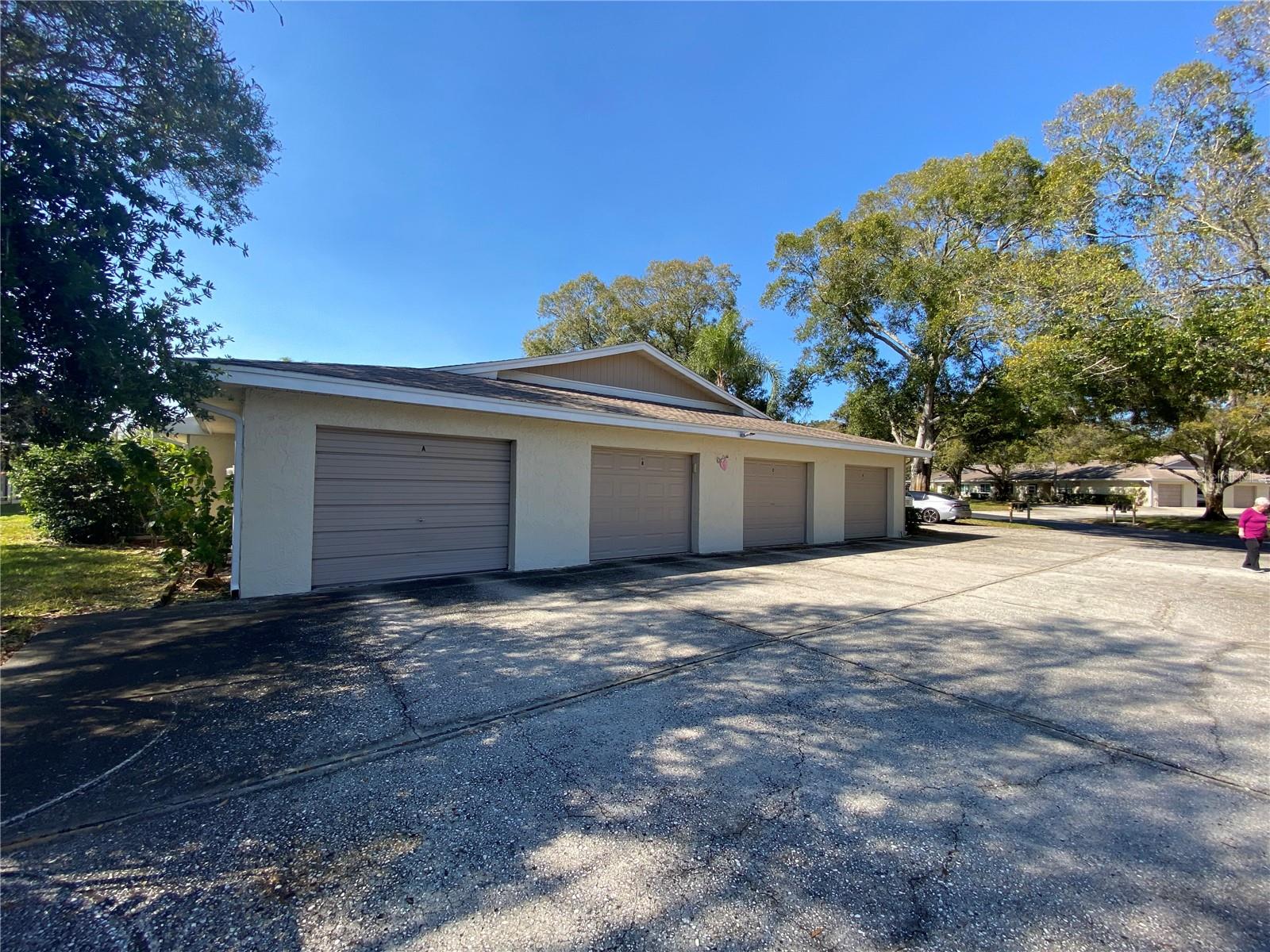 Single car garage offers plenty of space for golf cart also.