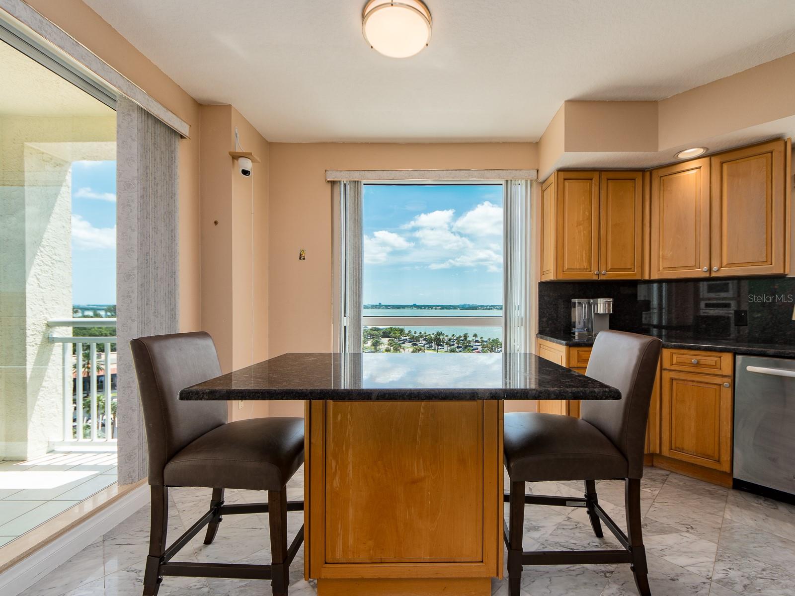 Eat in kitchen area with large custom island.