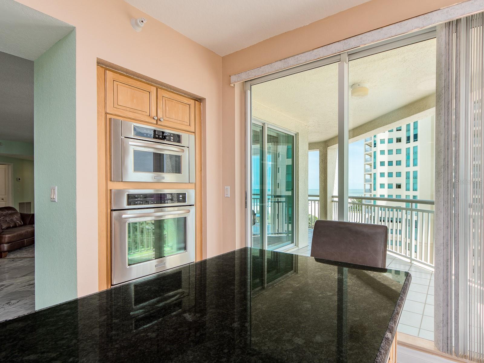 Enter your balcony from the kitchen area. Also, features a build in over and microwave for convivence.