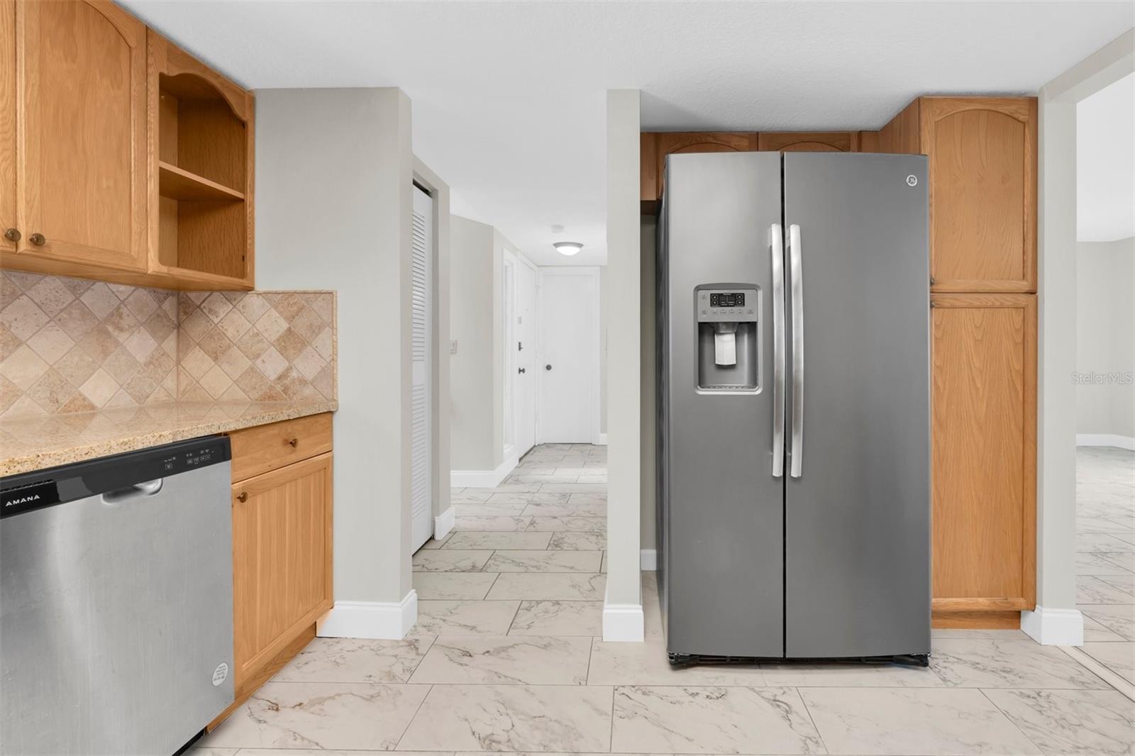 Fridge and additional cabinetry