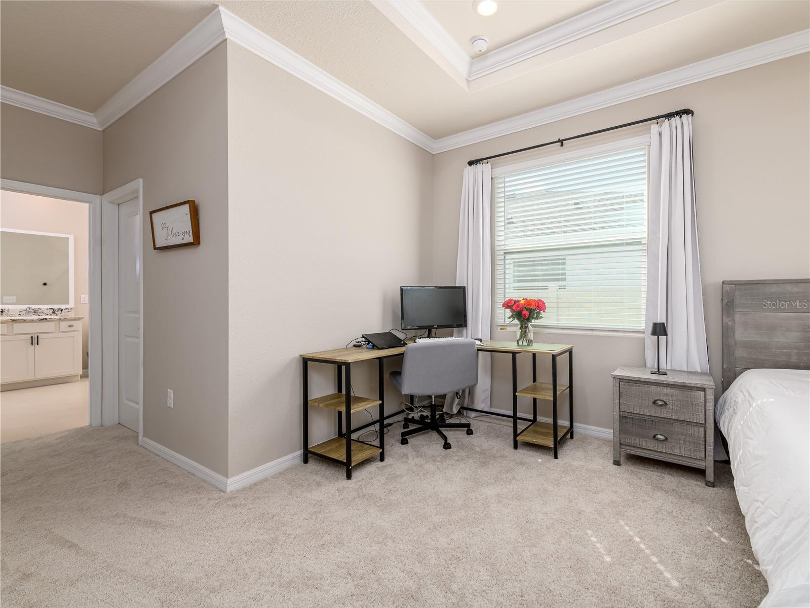Primary bedroom with enough space for home office