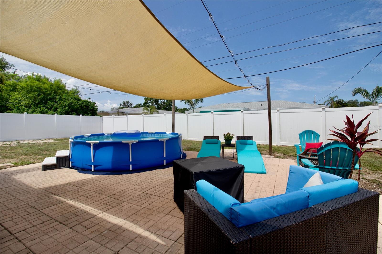 Pavered Backyard PatioTemp Pool that stays!