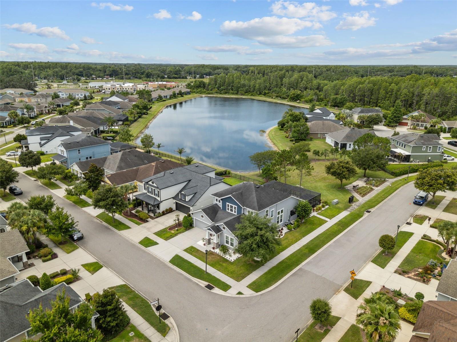 Beautiful Asturia home with pond views and a fenced backyard