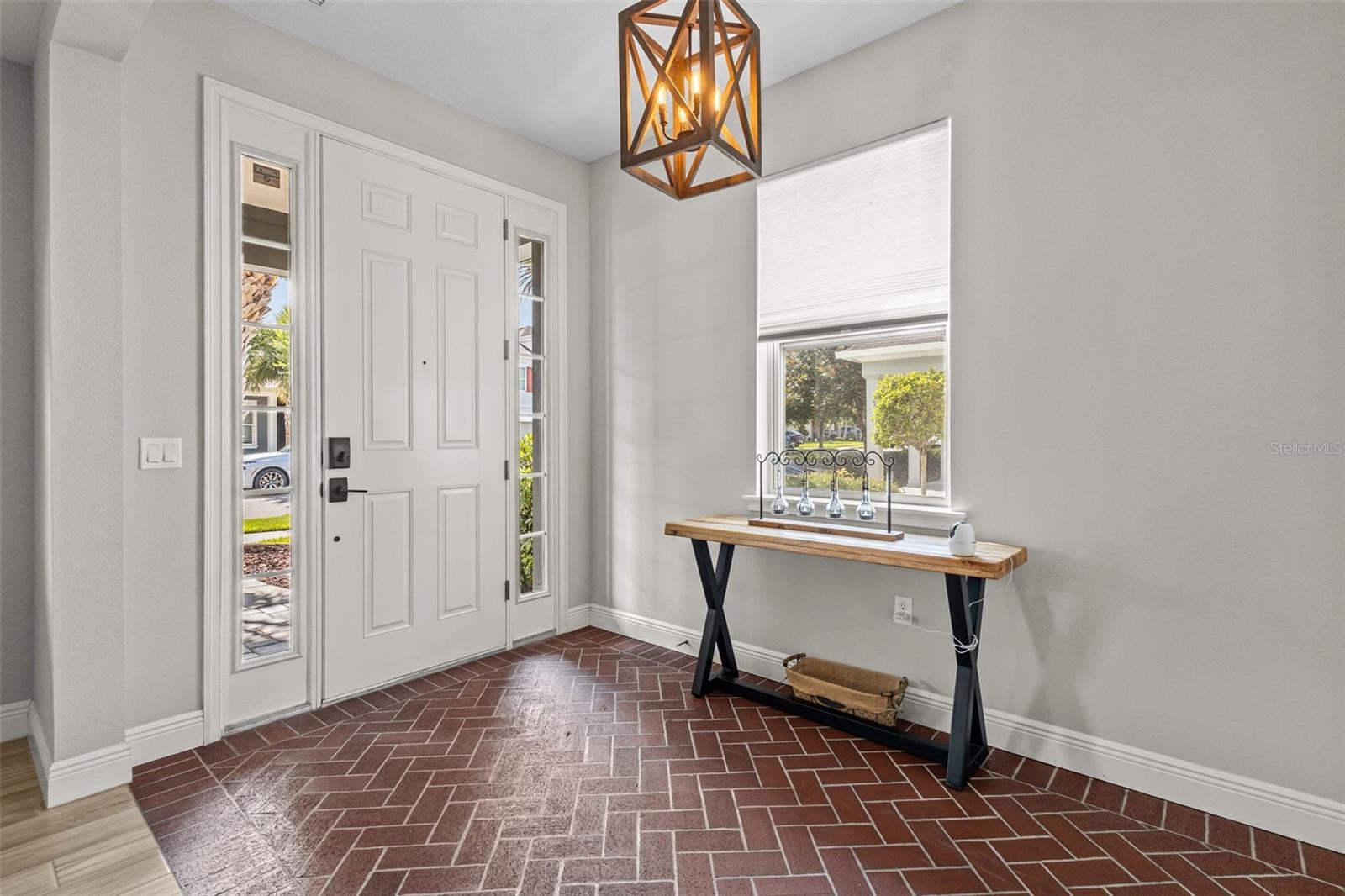 Distinctive brick-floor entry makes a standout first impression
