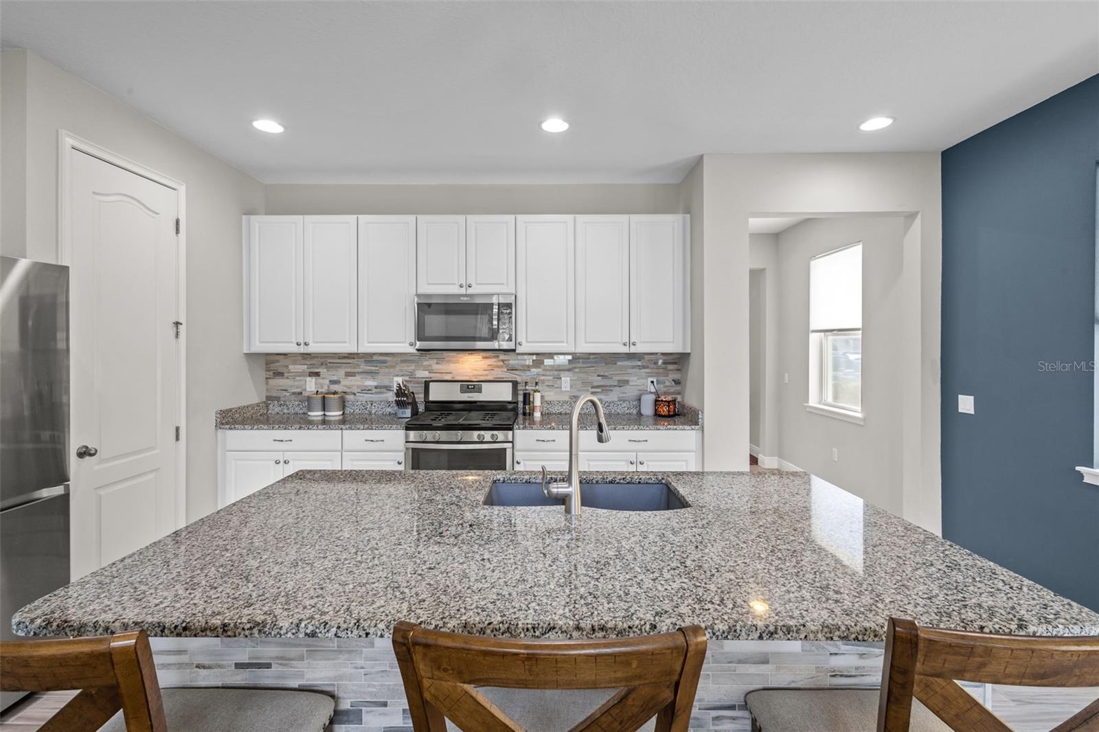 Spacious kitchen with generous prep space and storage