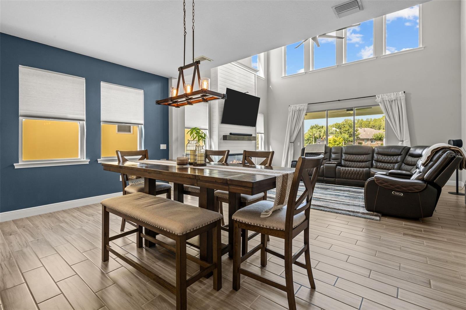 Dining area positioned between the kitchen and living room