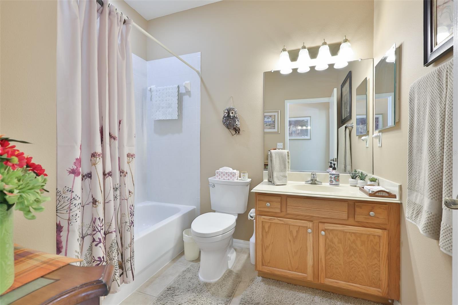 Like new and spotless guest bath.