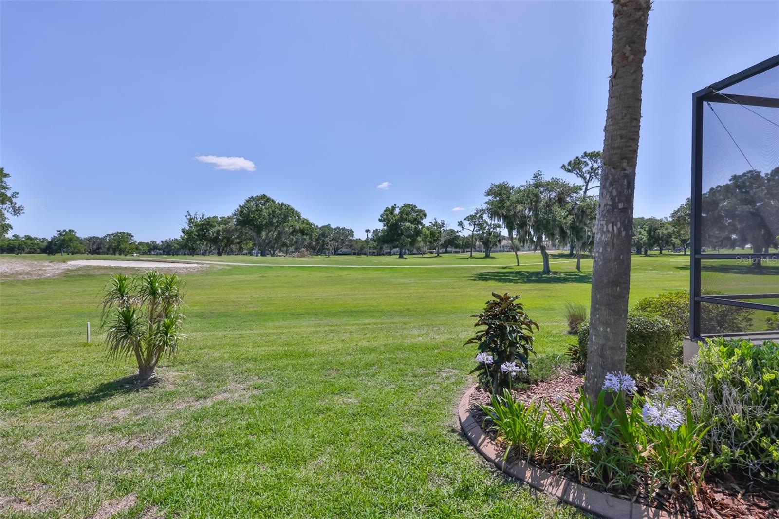 The perfect view with lovely mature landscaping, not one weed in these beds!