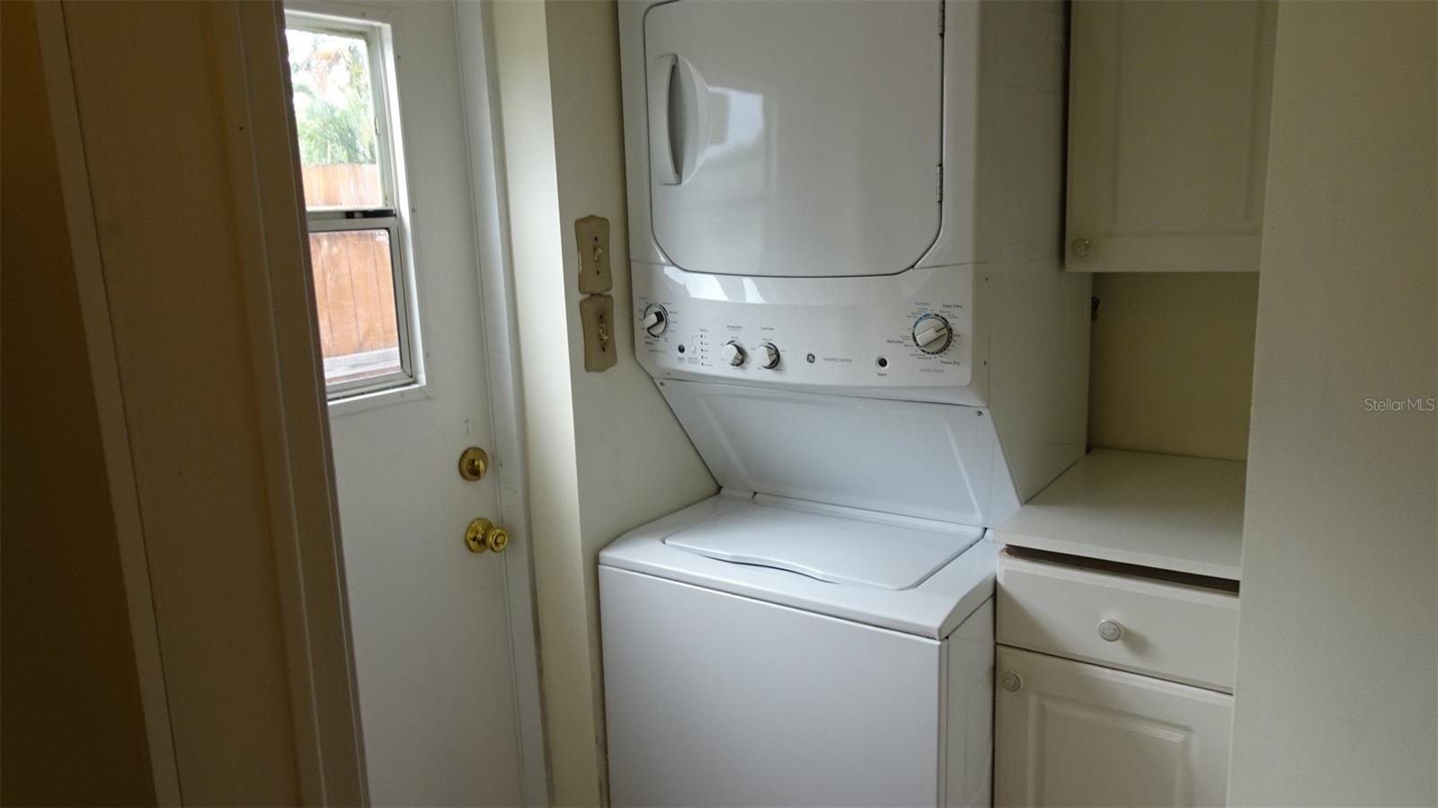 Large walk-in storage closet opposite the washer/dryer, included in sale.
