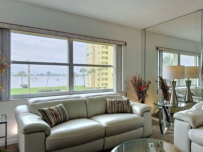 Coastal comfort-Modern furnishings meet tranquil intercoastal views for the perfect blend of style and relaxation.