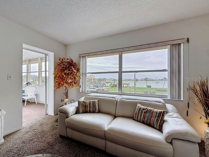Coastal comfort-Modern furnishings meet tranquil intercoastal views for the perfect blend of style and relaxation.