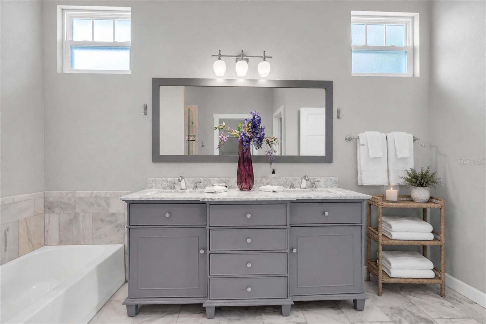 Marble Shower & Dual Vanities