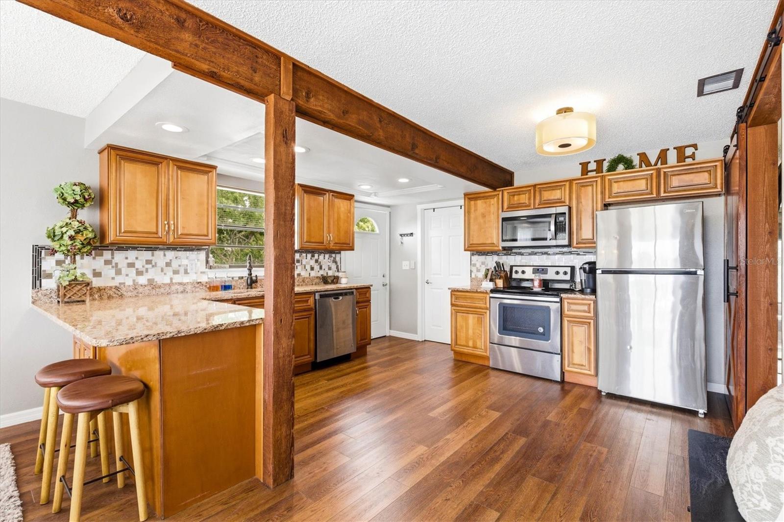 Kitchen with Wood Cabinets & Granite Counters