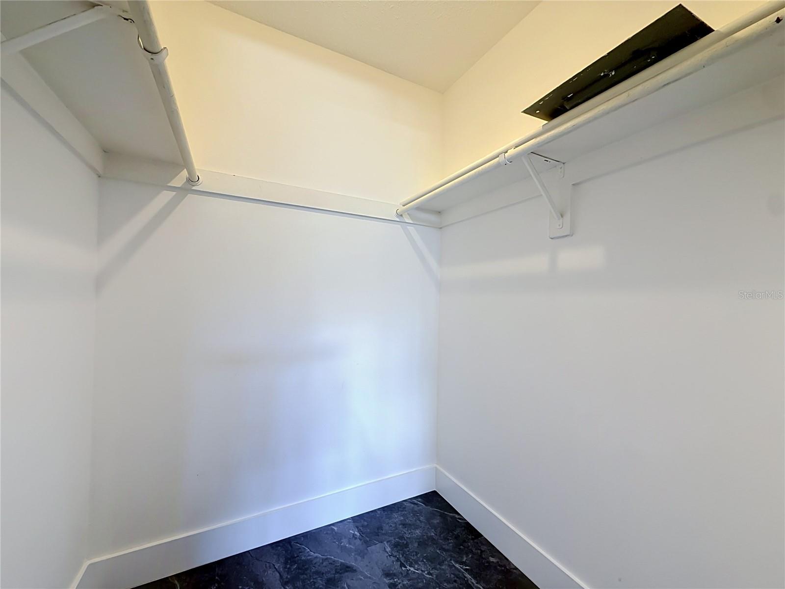 walk-in closet in bedroom