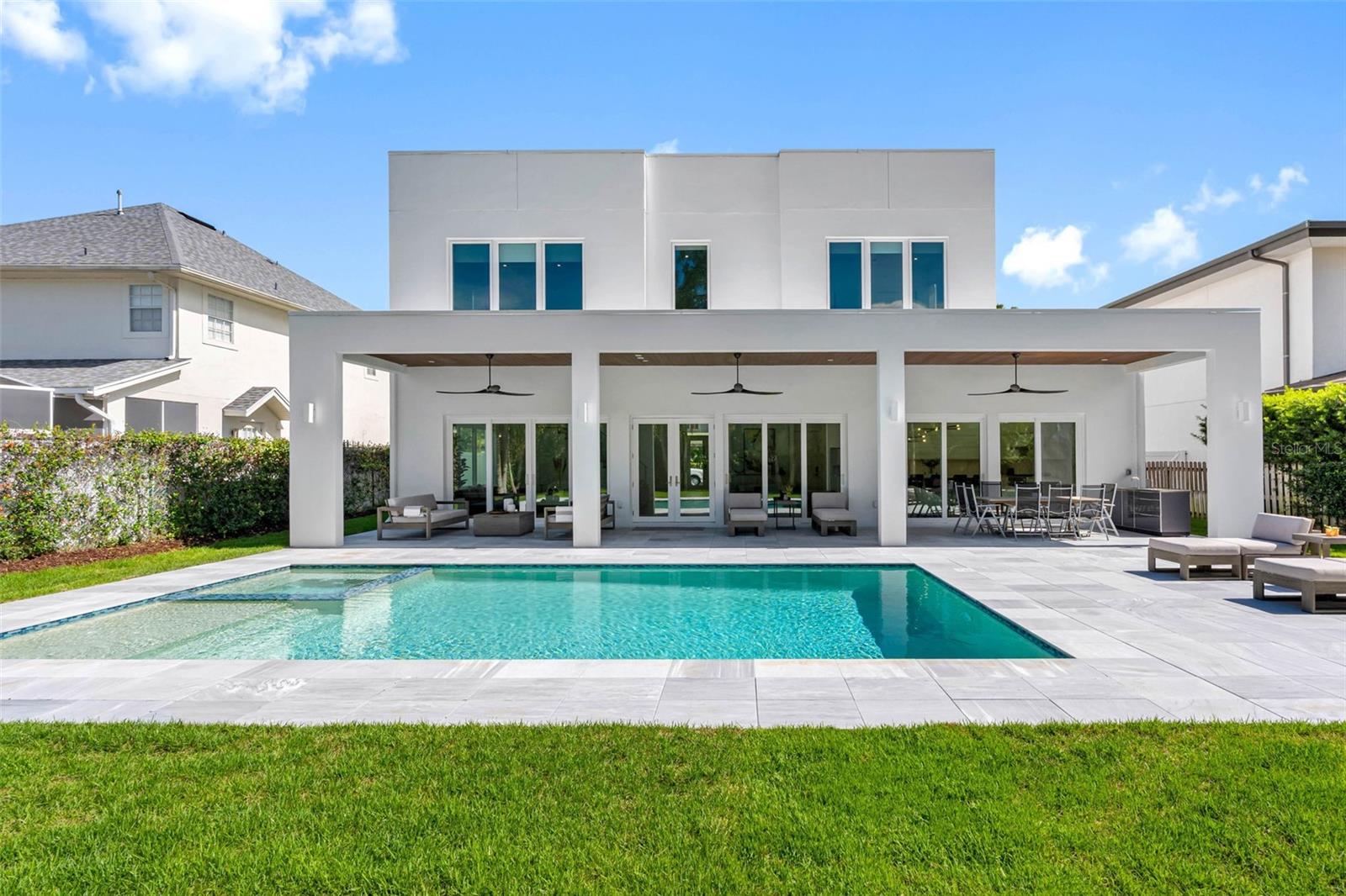 Energy efficient - 2story block home - PGT hurricane resistant windows - flat TPO 60 membrane roof with 5" insulation to withstand Florida's climate