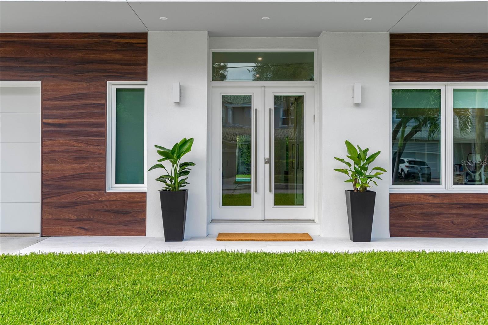 Front entrance-French glass doors.Outdoor lighting with dimmer