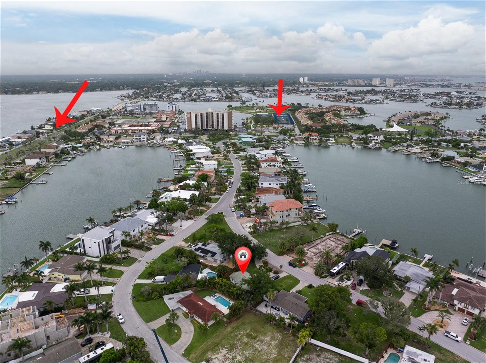 About 14 homes to golf and tennis or go left to pathway to beach