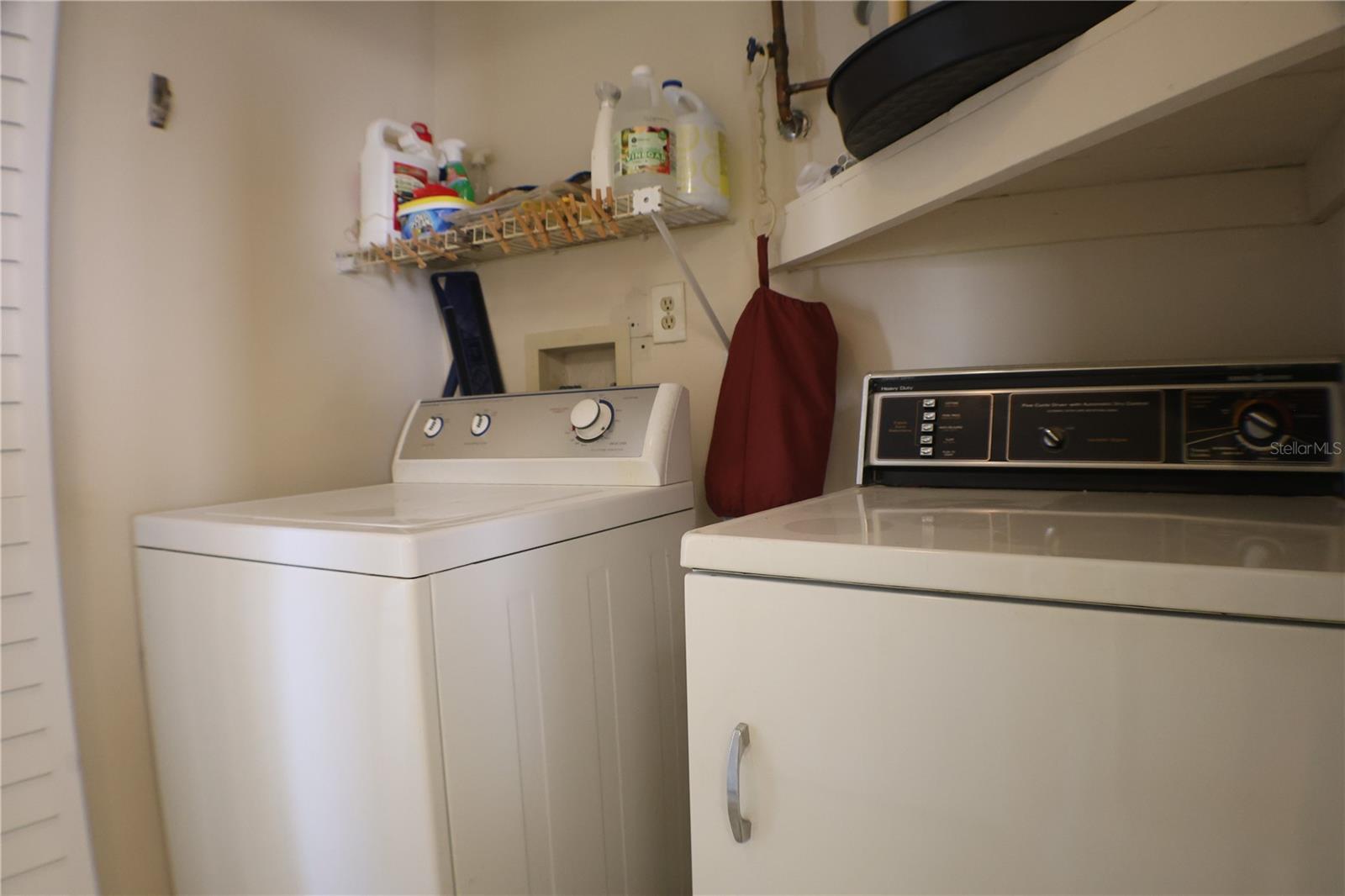 Washer and Dryer off kitchen