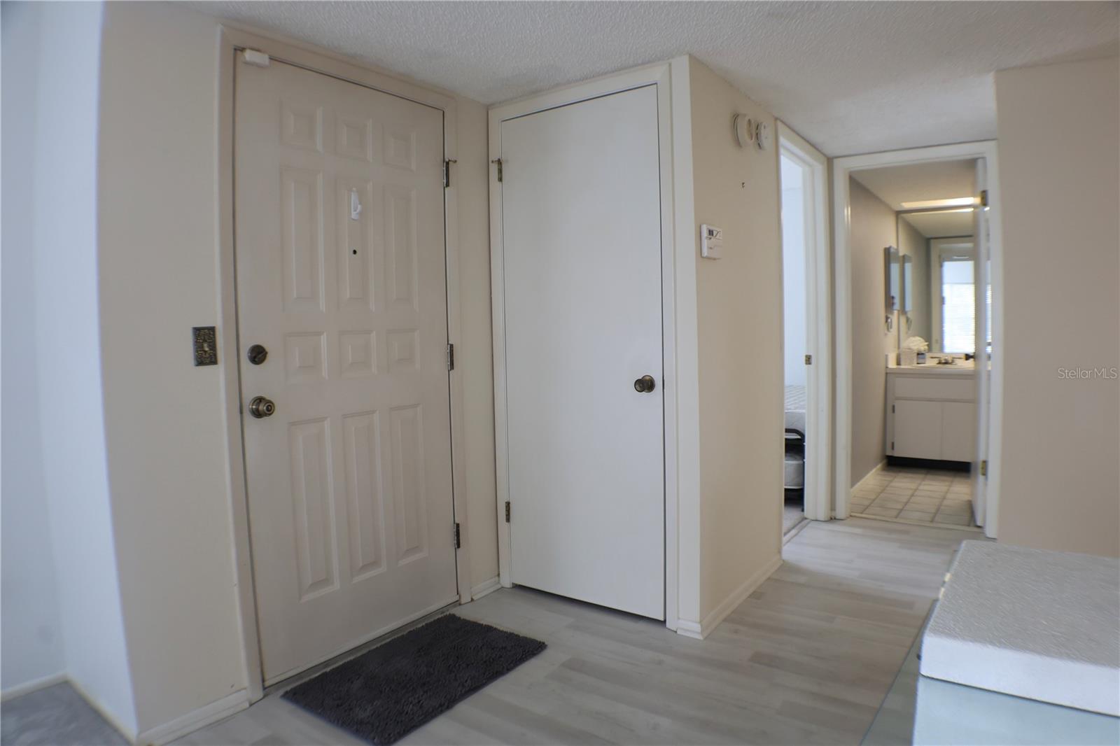 Entryway to guest room and bath