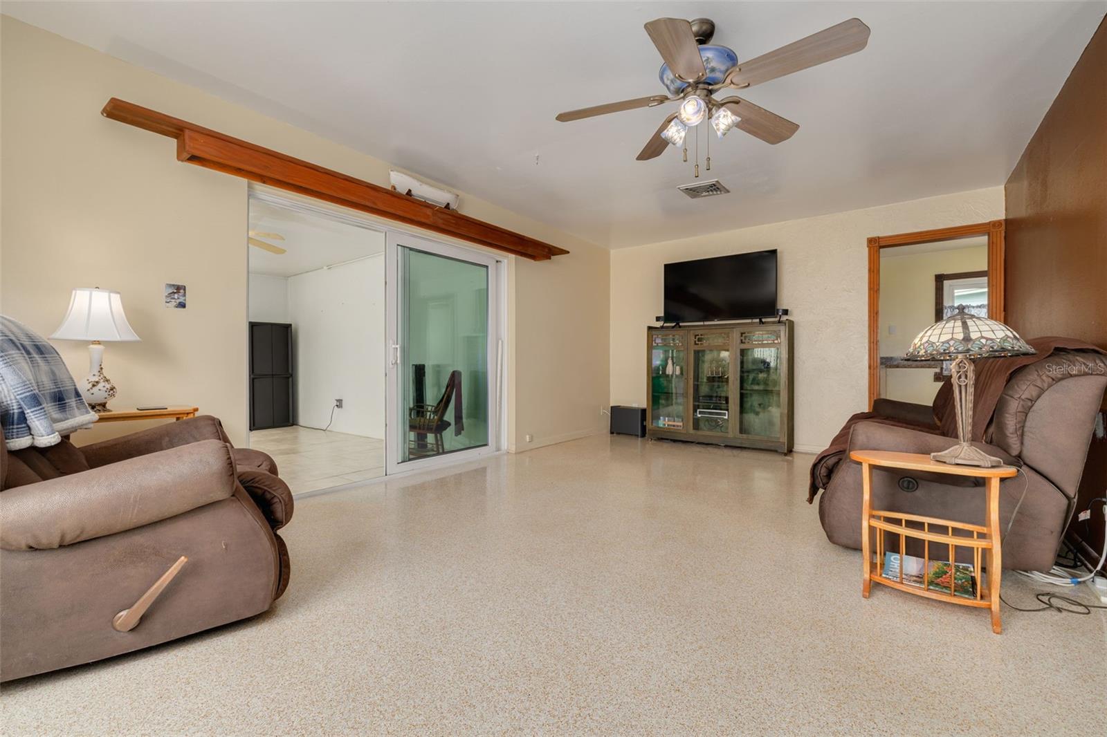 Living room with Sunroom Access
