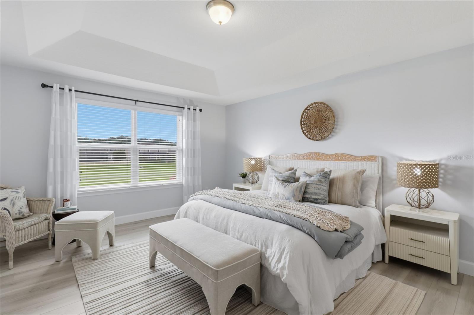 Retreat to the spacious primary bedroom, complete with dual walk-in closets for exceptional storage.