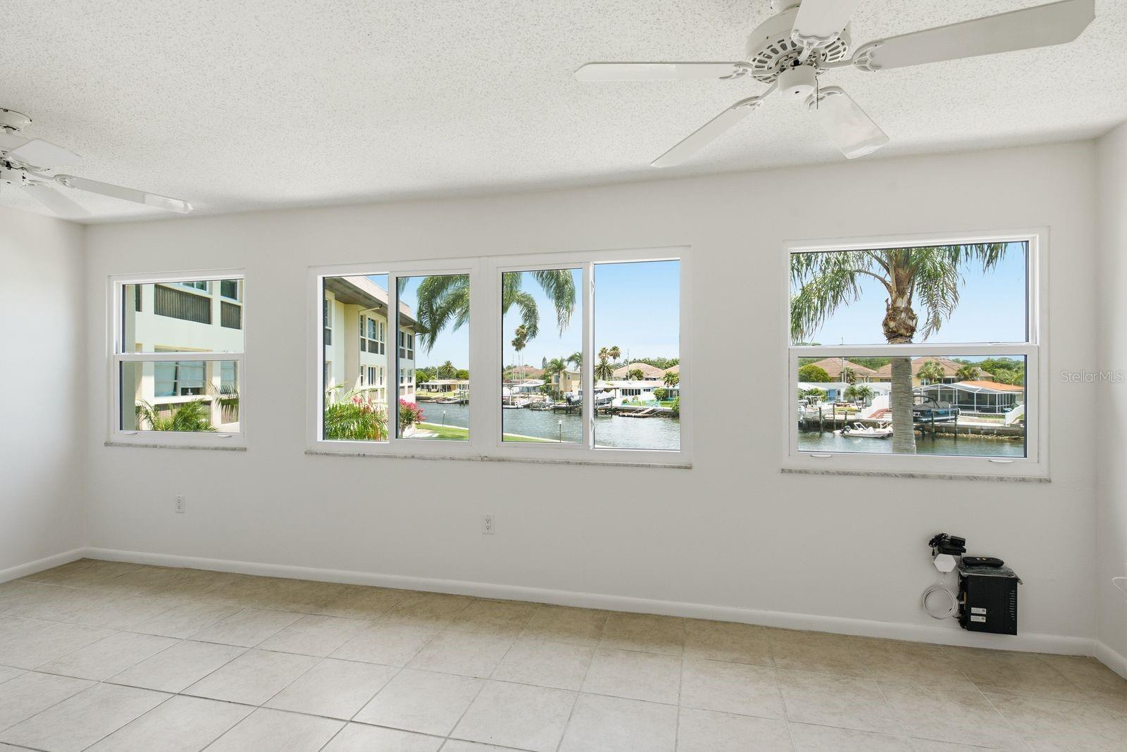 Florida Room with hurricane rated windows and view of North Chanel.