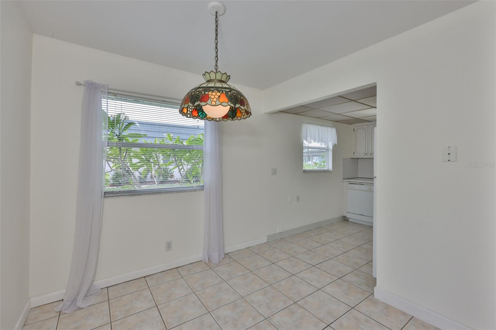 The dining area is conveniently next to the kitchen.