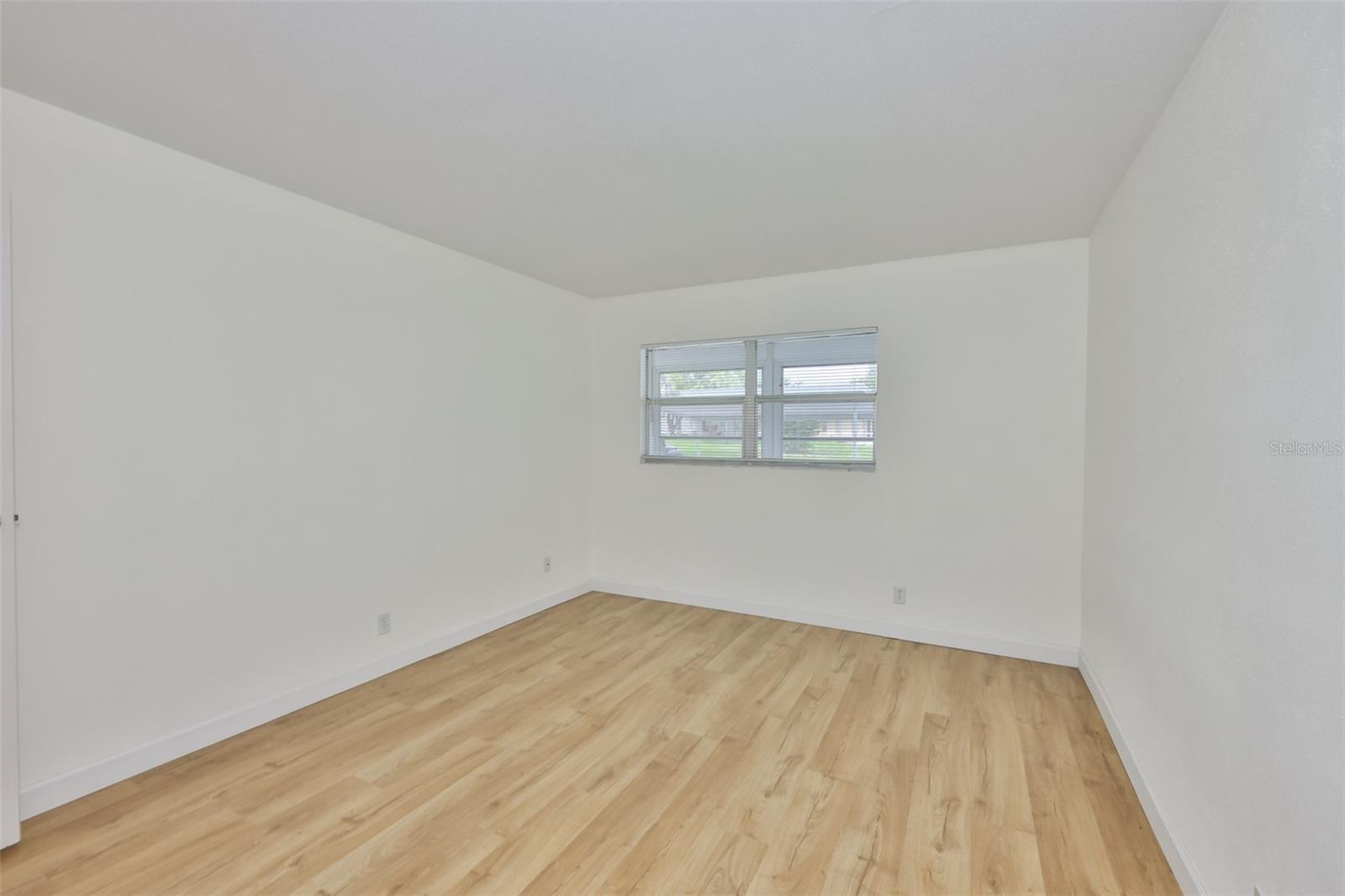 Lovely, clean, Pergo laminated floors and a double window make this a very comfortable room.