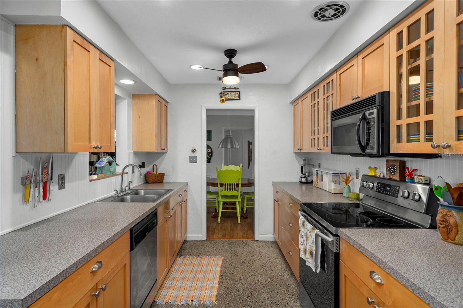 View to the dining area from back of kitchen