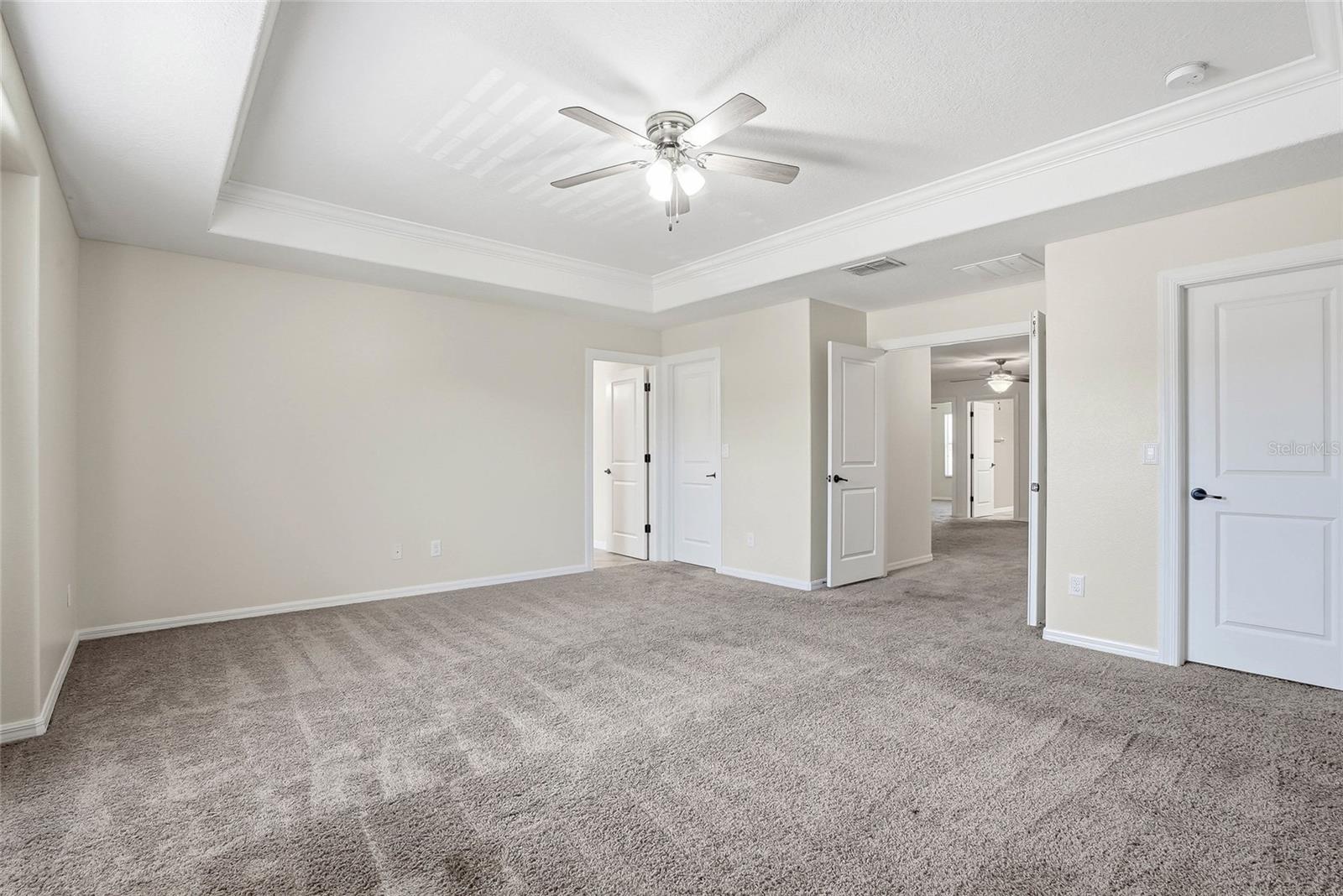 Two walk in closets, one on either side