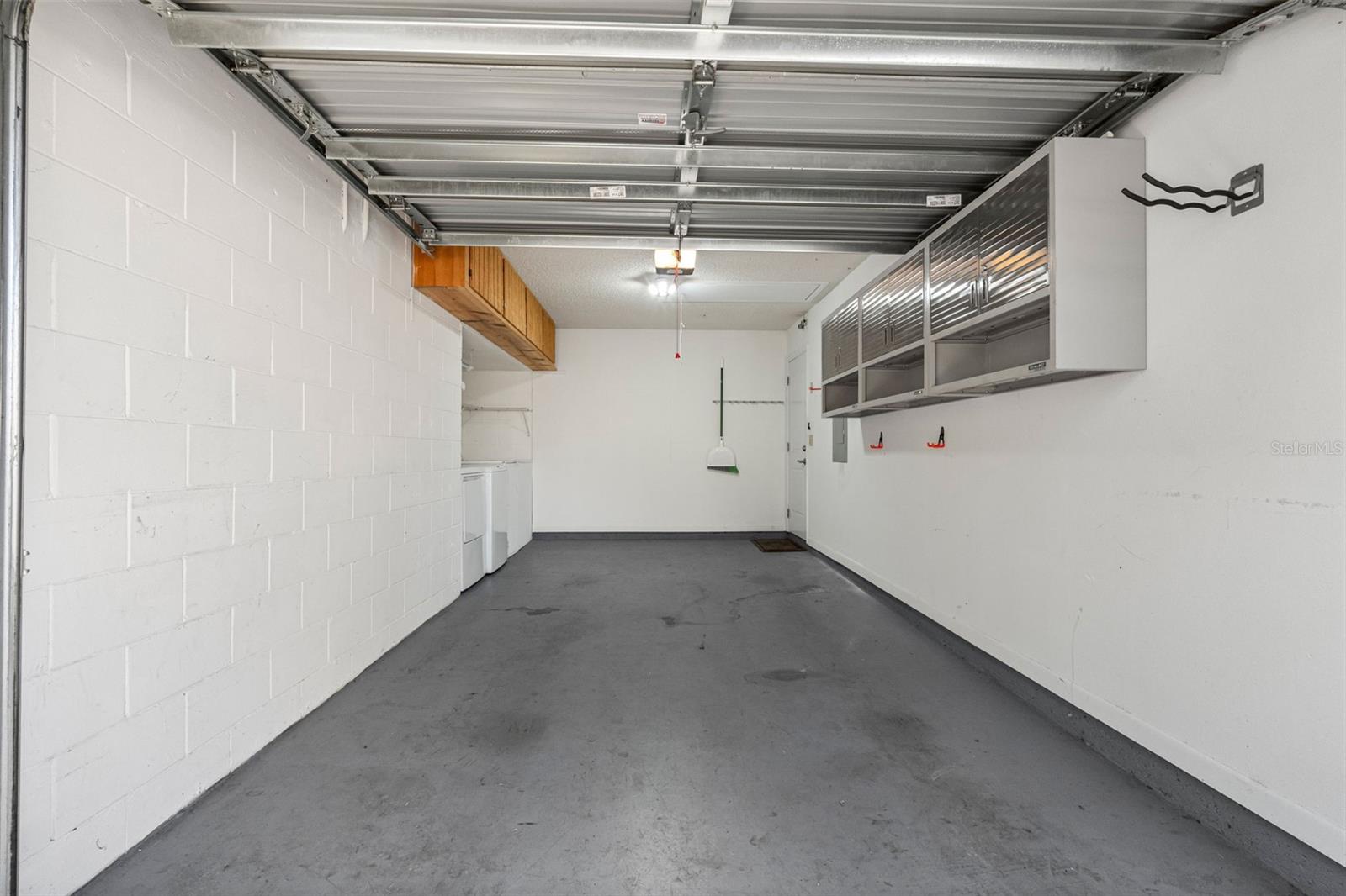 Garage with storage and access to attic